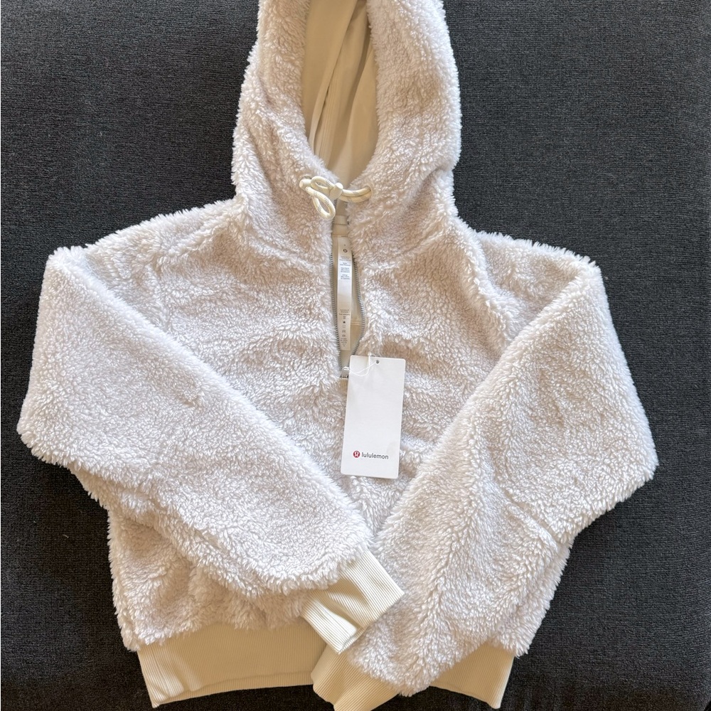 Lululemon textured fleece half zip. New with tags. Size 4.